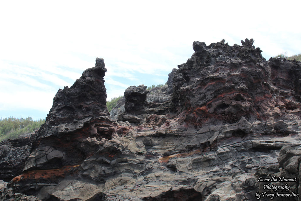 The Volcanic Rock Backdrop of the Olivene Pools