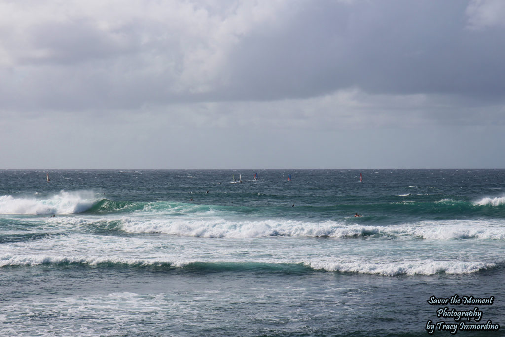 Wind Surfers and Surfers at Ho'okipa Beach in Maui